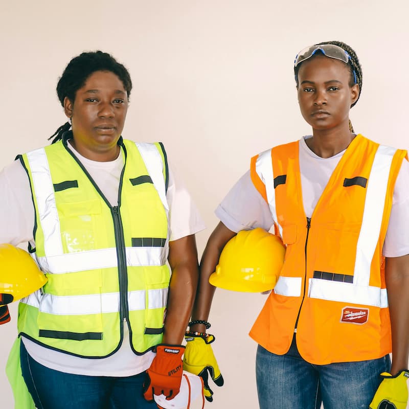 Women wearing PPE and work wear