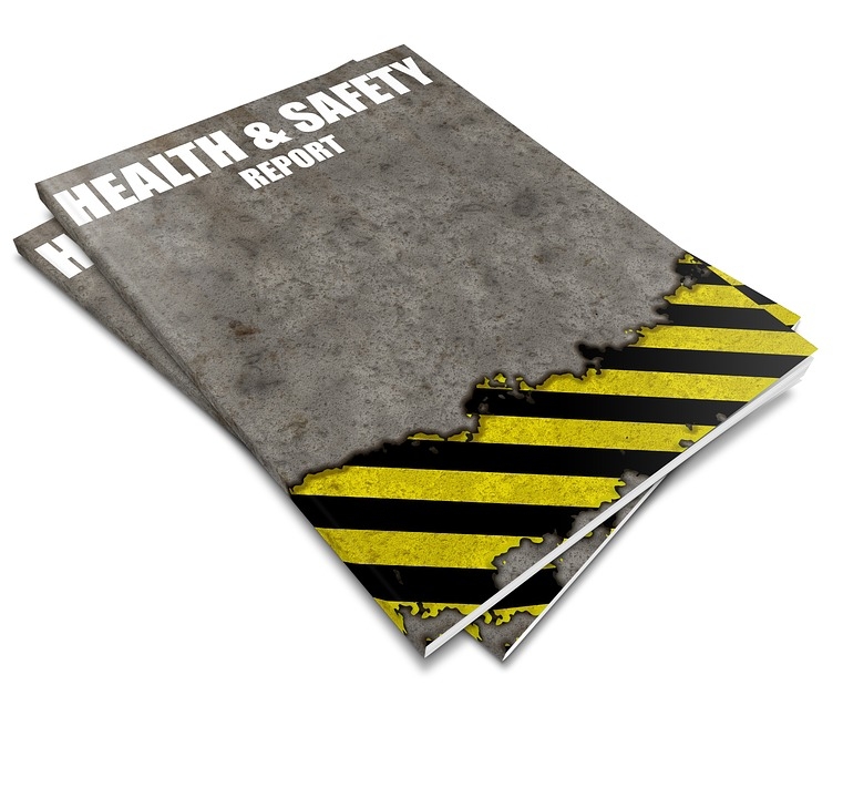 Grey booklet with hazard tape and wording: Health & Safety Report