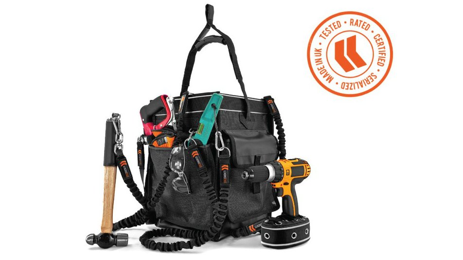 Height safety tool bag with tethered hammer, tethered power drill and various tools