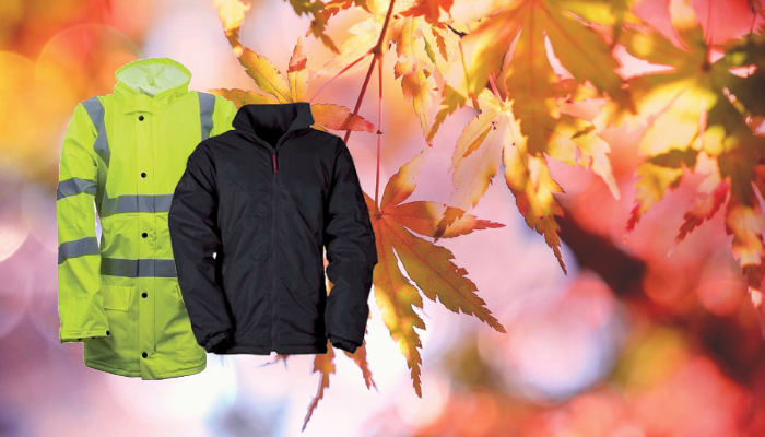 Yellow high-visibility coat with black thermal work jacket on autumnal background