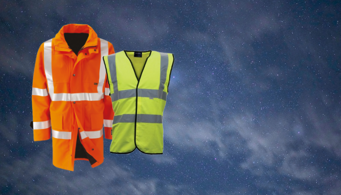 Orange hi-vis jacket and yellow hi-vis vest on blue background