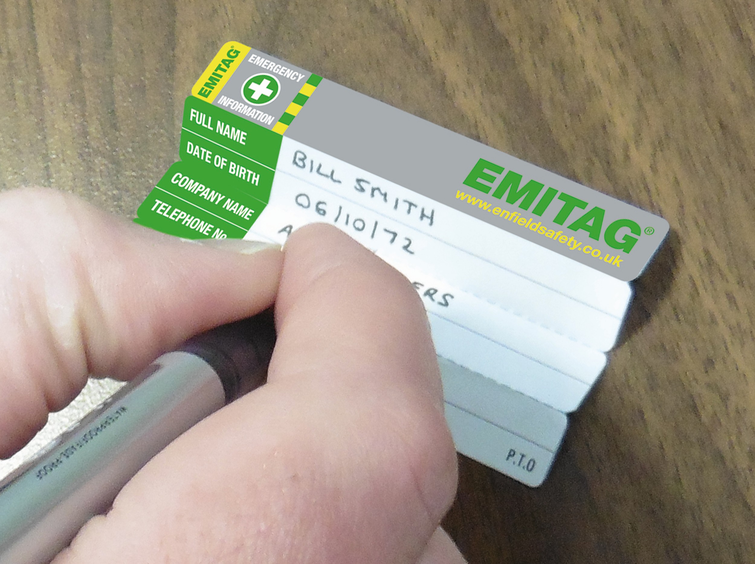 A person completing vital emitag information in case of an emergency 