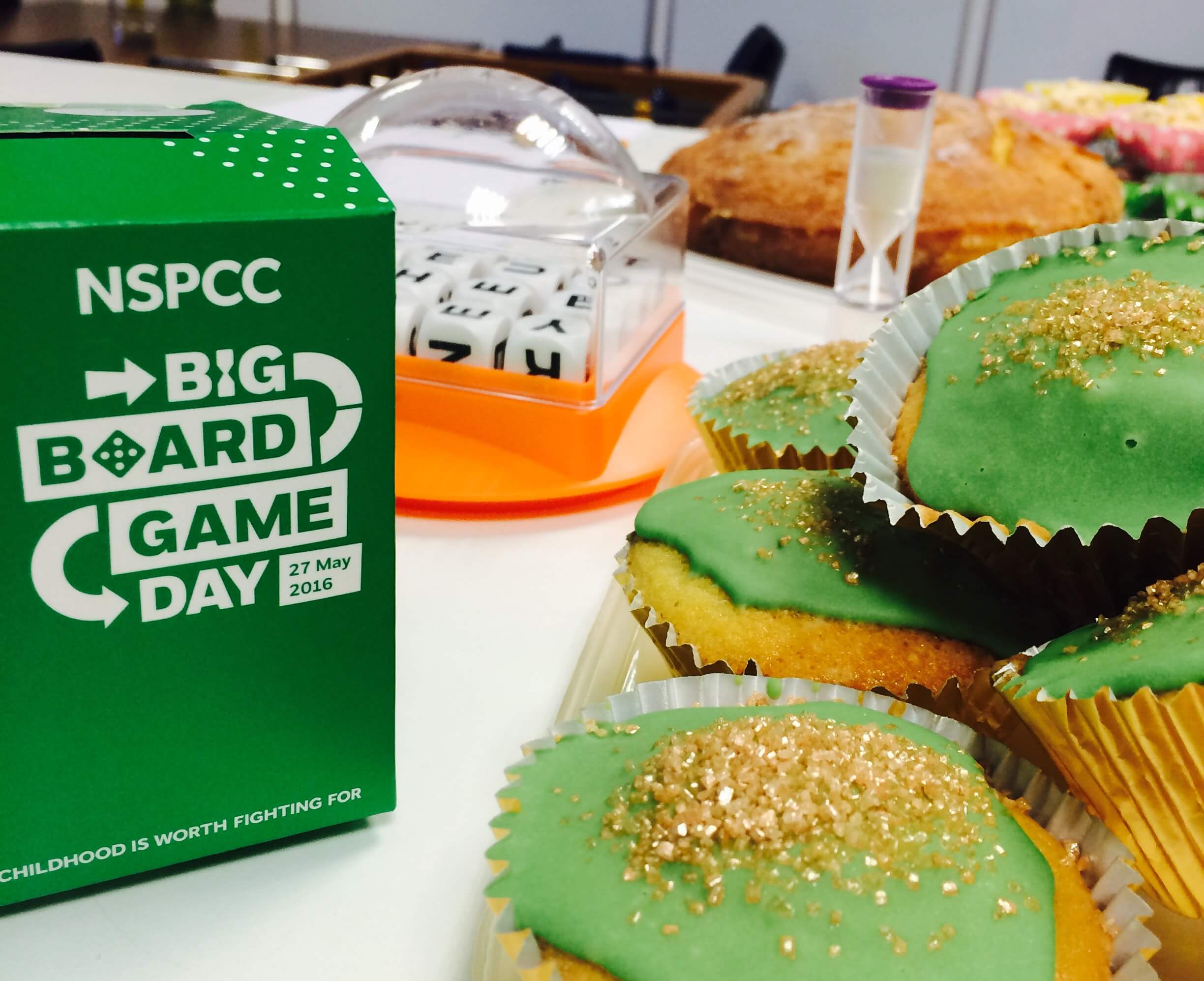 Green cupcakes and NSPCC box for big board game day